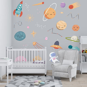 Space wall stickers with sleepy planets displayed in a baby nursery; space rocket ship, space ship, astronaut, stars and more